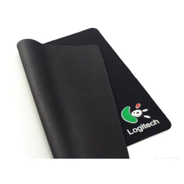Black mouse pad with Logitech logo on a white background