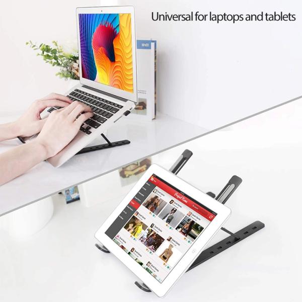 A black adjustable laptop and tablet stand shown on a white desk, supporting a silver laptop and a white tablet. A pair of hands is visible typing on the laptop in the upper left, and text at the top reads 'Universal for laptops and tablets'.