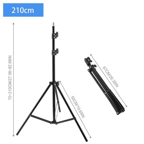 Black metal tripod stand shown on a white background with dimension annotations: full standing height 210 cm, folded height 67 cm, and leg measurements in centimeters with force values. A blue '210cm' label appears in the top left.