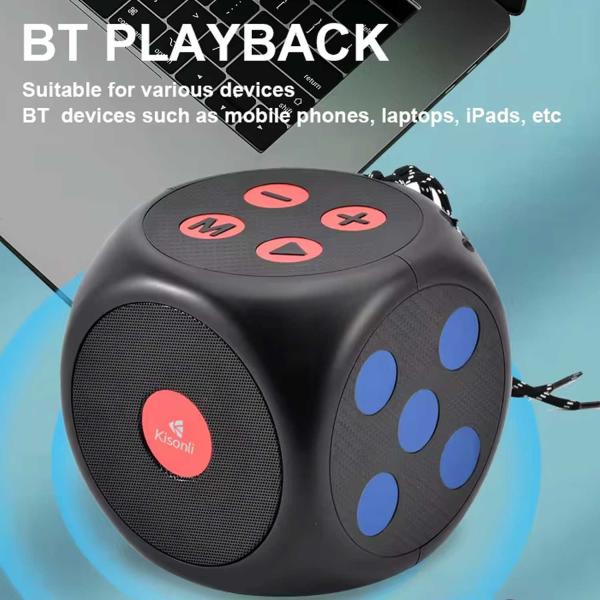 Black dice-shaped Bluetooth speaker with control buttons on a blue gradient background