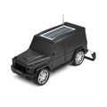 Black toy car with solar panel on a white background