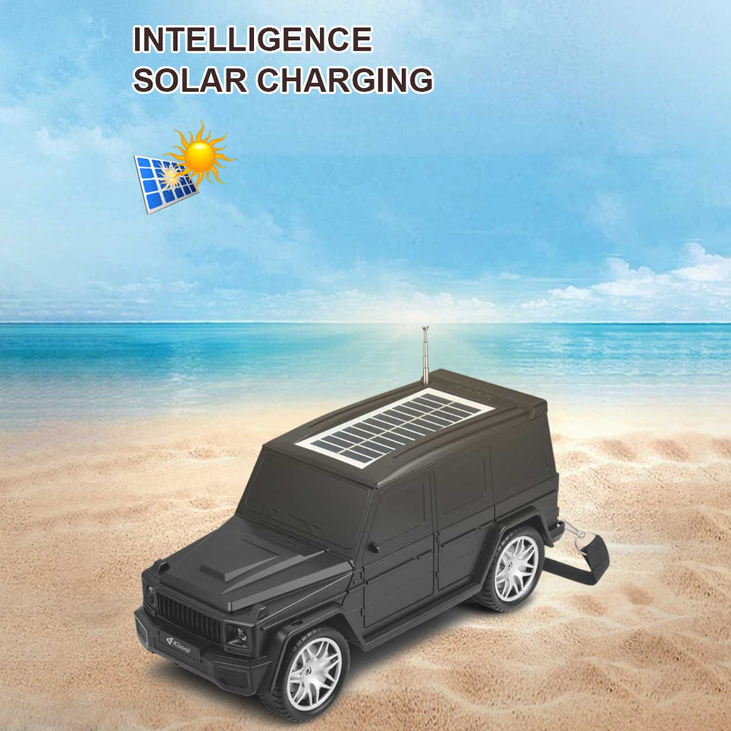 Model of a vehicle with a solar panel on a beach background, emphasizing solar charging technology.