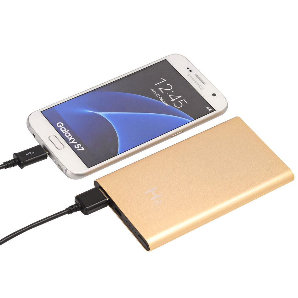 H8 HD 1080P night vision hidden WiFi power bank camera resting on a wooden desk