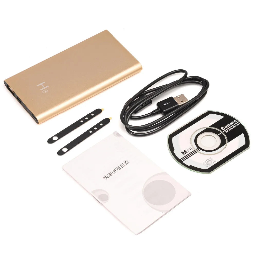 H8 HD 1080P night vision hidden WiFi power bank camera resting on a wooden desk