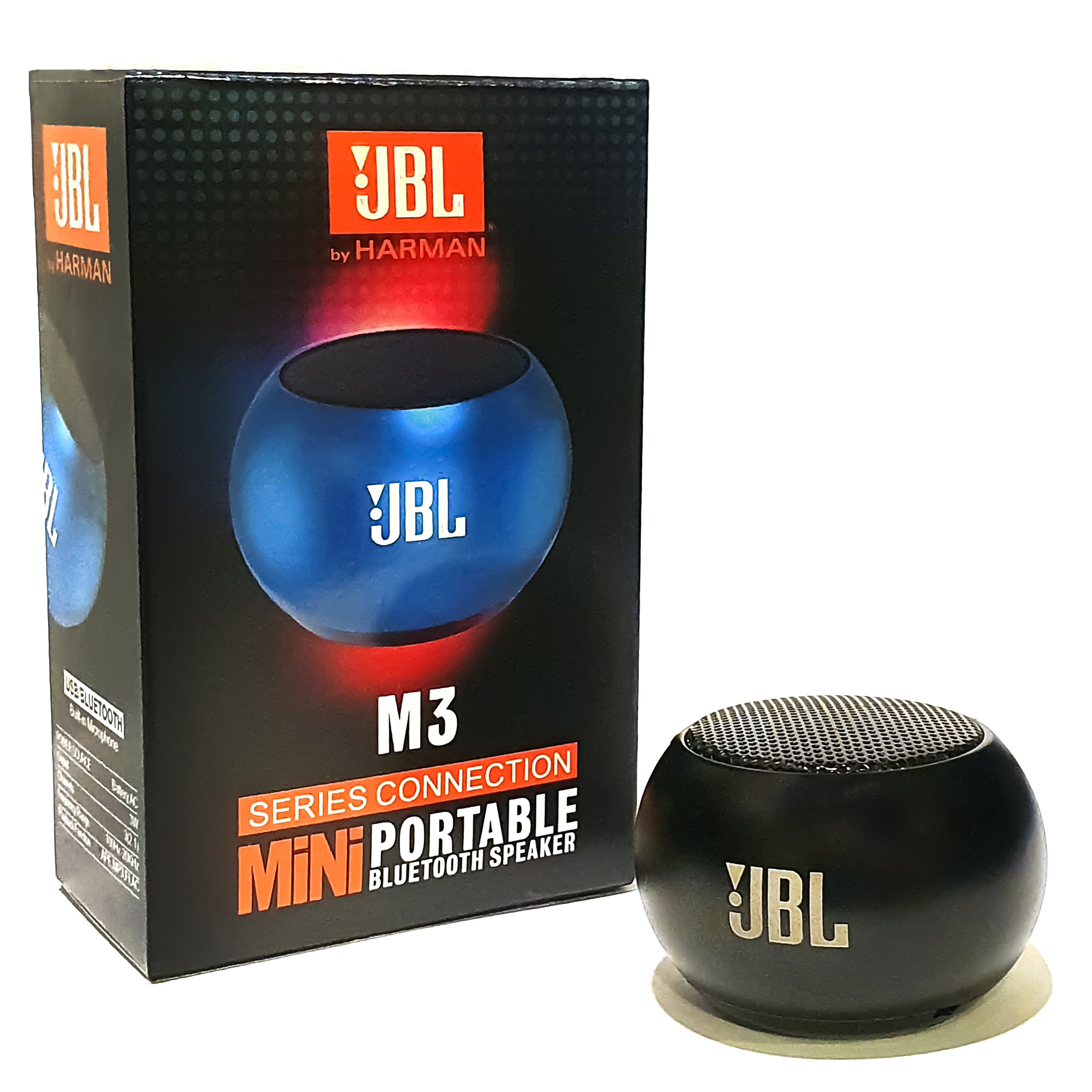 JBL M3 Mini portable speaker connected via Bluetooth to a smartphone playing music on a wooden desk